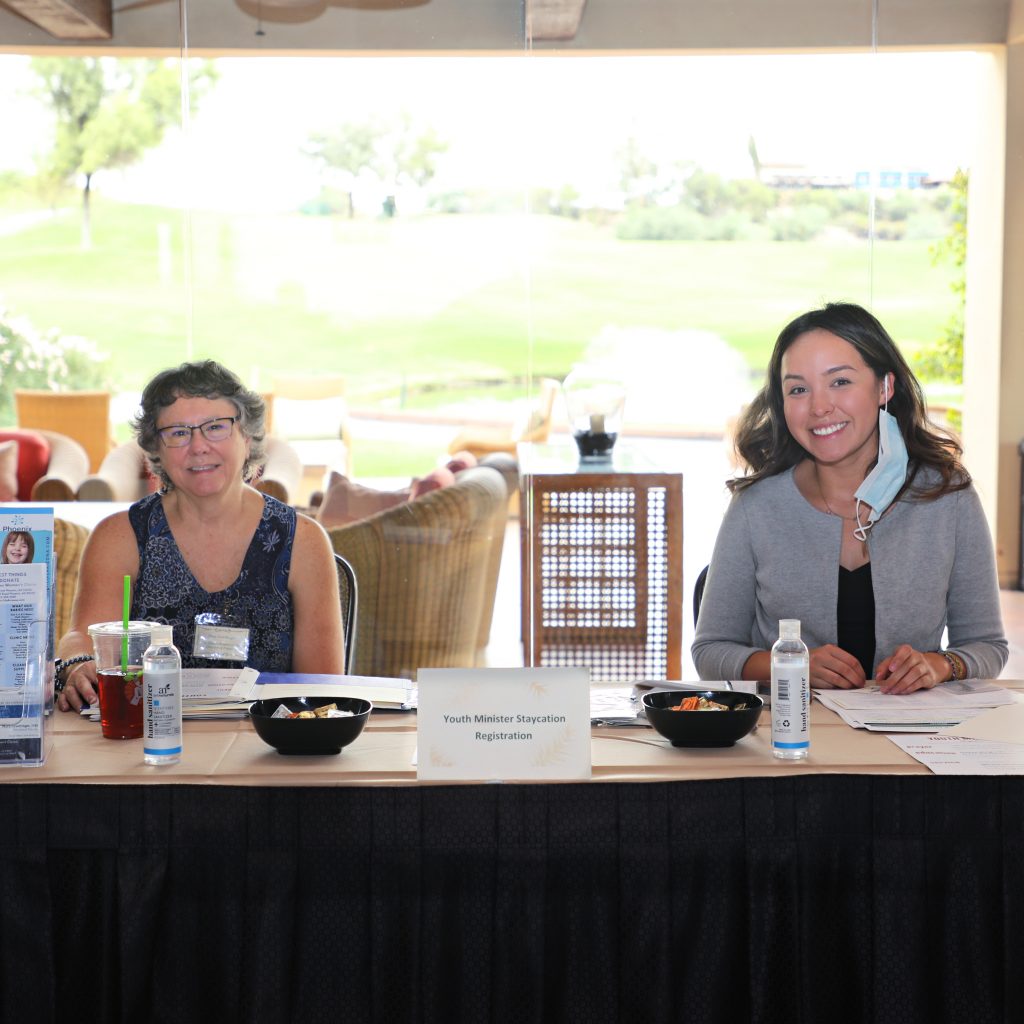 A white background with a pattern of leaves.